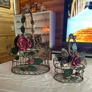 Metal rose baskets big and small pair